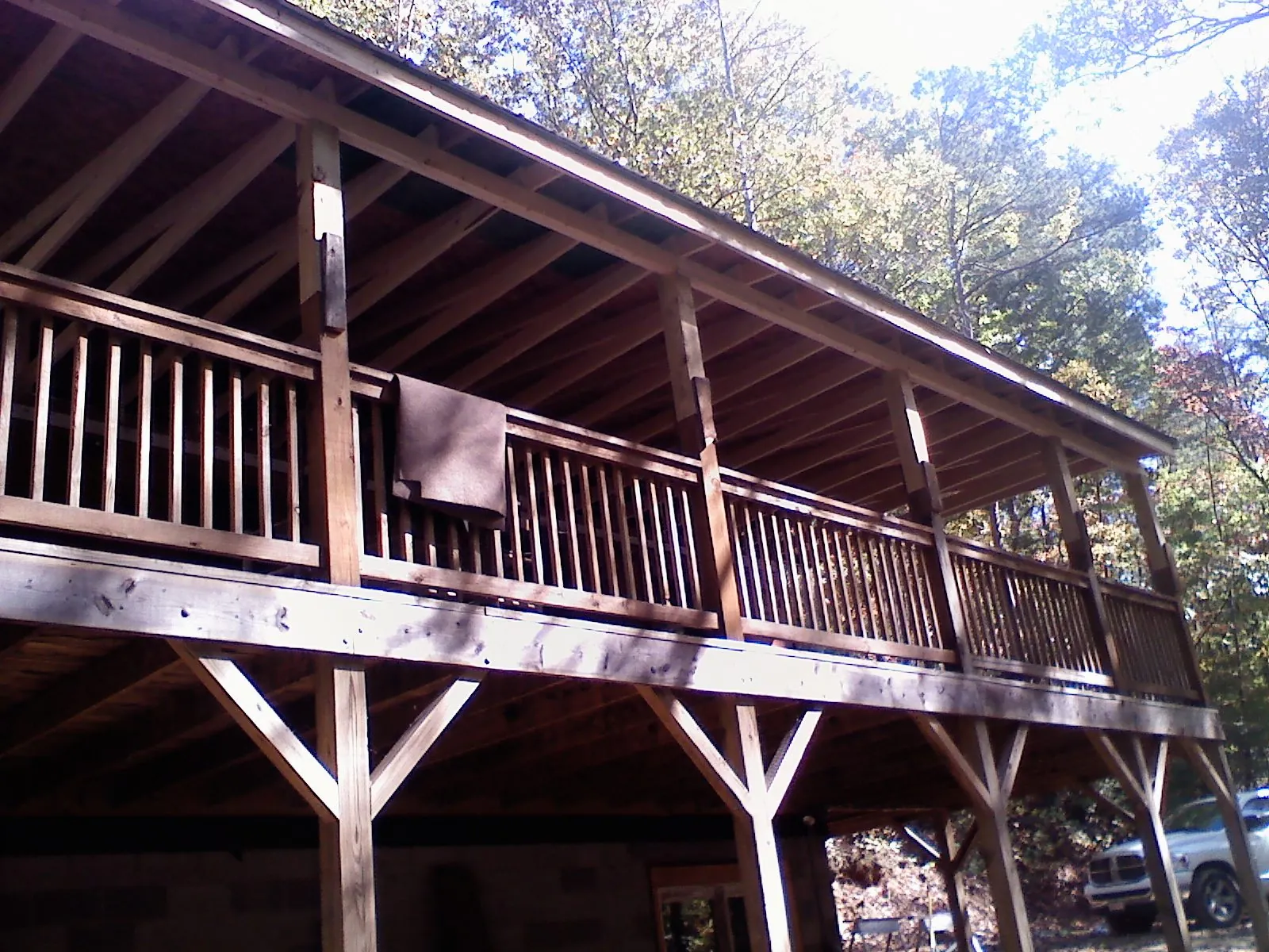 Timber framing under a new elevated porch and deck — Roof Leak Repair in South Hill by Roofing Brothers